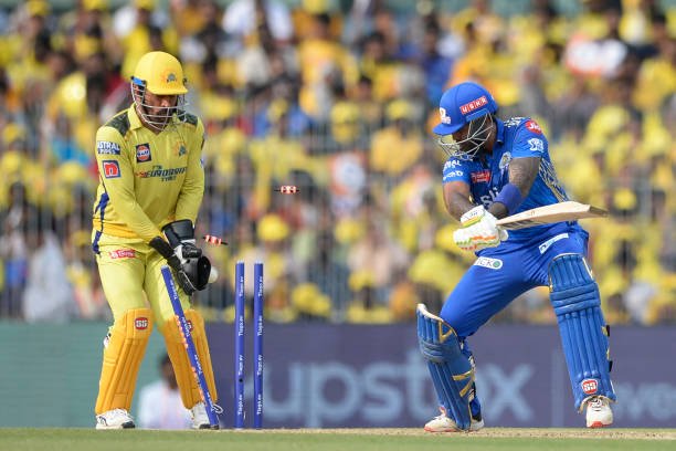 Mumbai Indians' Suryakumar Yadav (R) is bowled by Chennai Super Kings