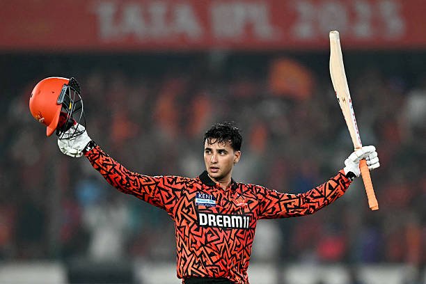 TOPSHOT - Sunrisers Hyderabad's Abhishek Sharma gestures to the crowd after scoring 141 runs in 55 balls as he walks back to the pavilion after his dismissal during the Indian Premier League (IPL) Twenty20 cricket match between Sunrisers Hyderabad and Punjab Kings at the Rajiv Gandhi International Stadium in Hyderabad 